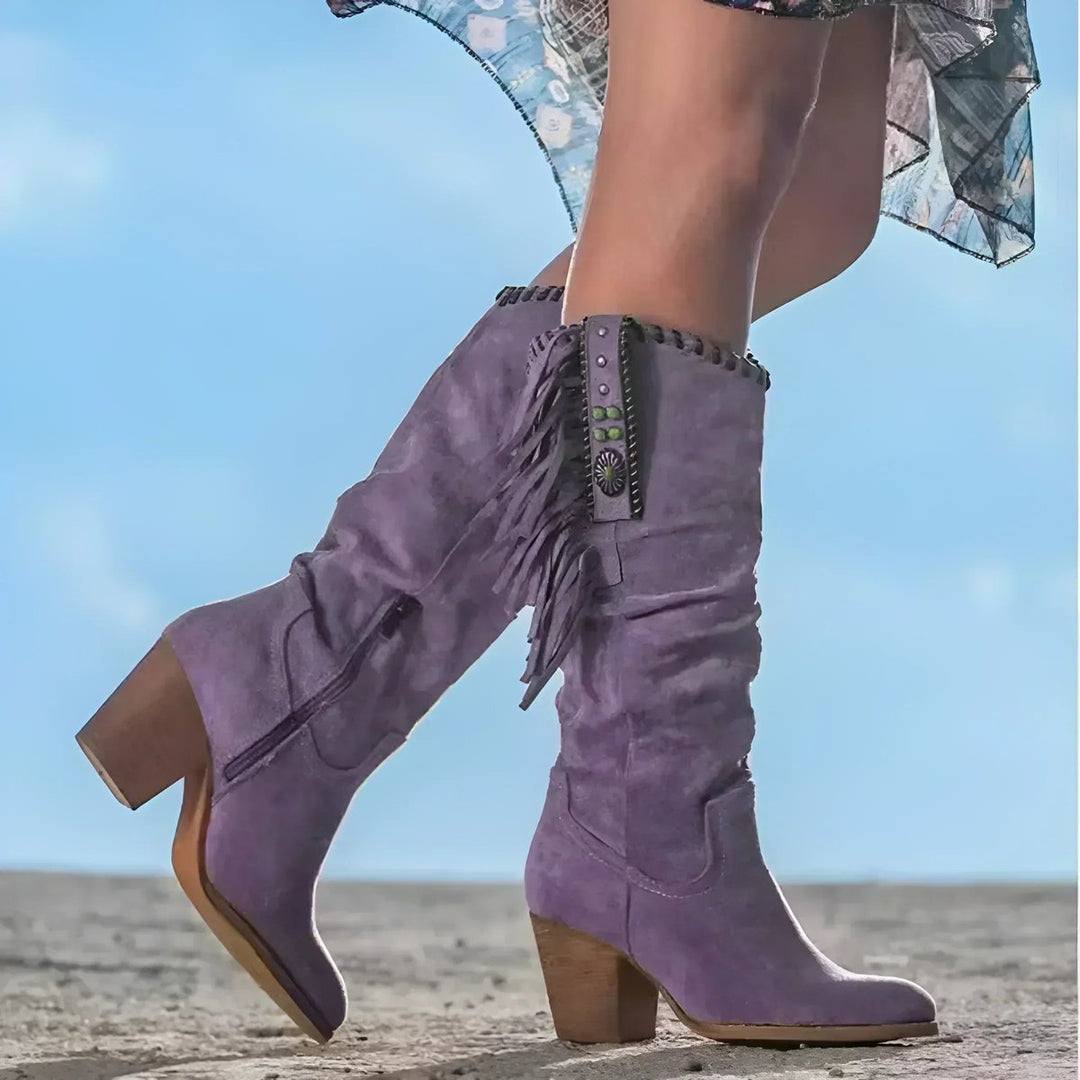 Boho-style women's knee-high boots featuring stylish fringe, tassels, and a comfortable block heel.