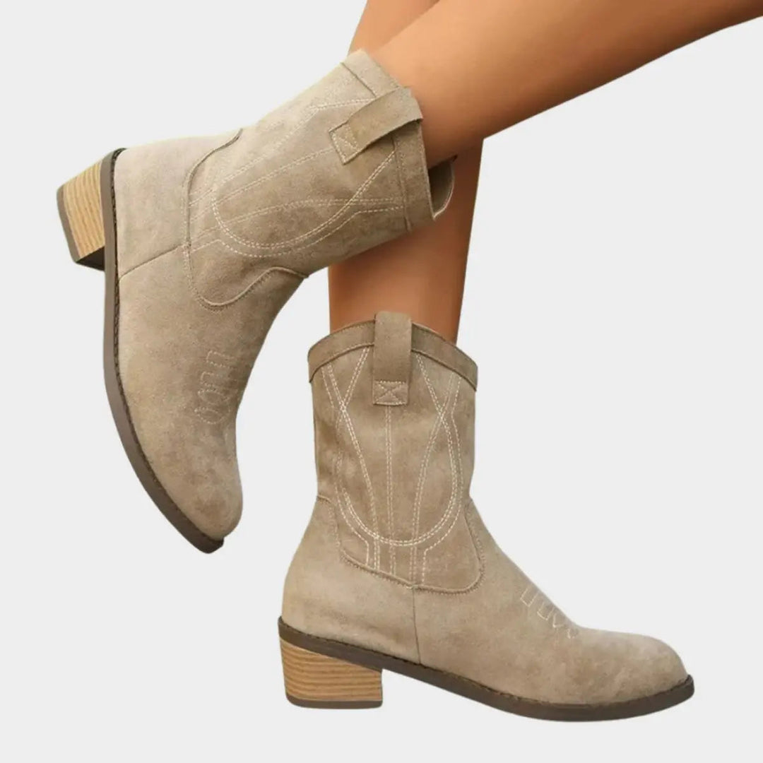 Embroidered women's western ankle boots, a stylish choice for casual wear and country-themed events.