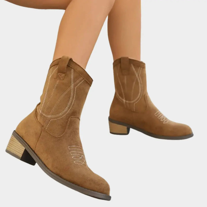 Trendy women's western boots with a comfortable block heel and signature cowboy ankle design.