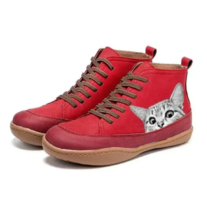 Women's high-top flat ankle boots with vibrant cat print, lace-up detail, perfect for casual wear.
