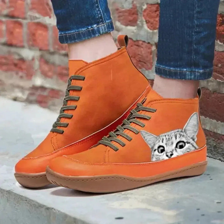 Stylish women's lace-up cat print high-top ankle boots. Flat sole provides comfort and a playful, unique look.