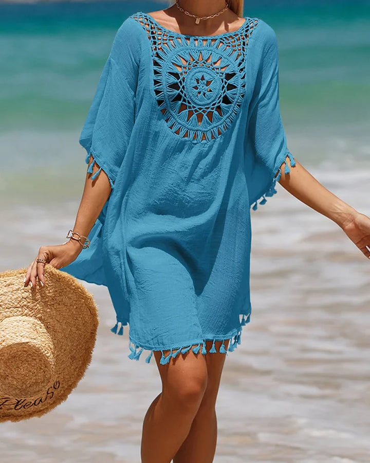 White boho mini dress cover-up, ideal for beach, pool, or resort, with delicate crochet and tassels.