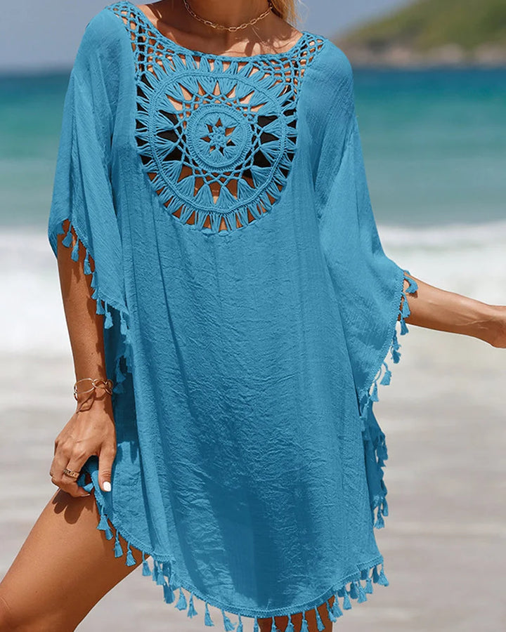 Stylish white boho swimwear cover-up for women, mini length, with elegant crochet detail & tasseled hem.