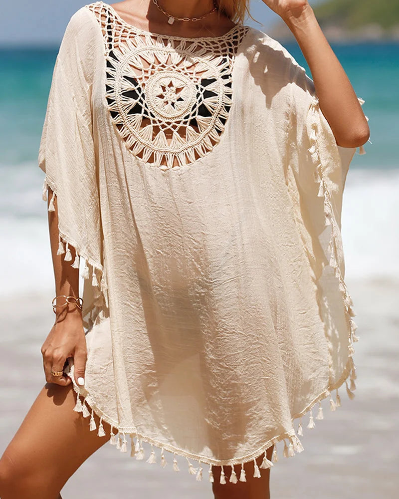 Boho white mini cover-up for women, featuring crochet yoke and tasseled hem, perfect resort wear.