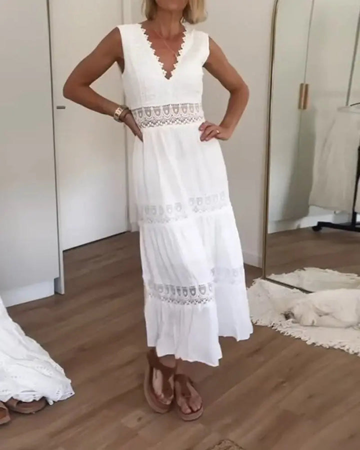 Chic women's white boho maxi dress, a V-neck lace wrap design offering elegant summer style and resort versatility.