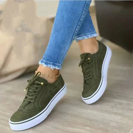 Women's white comfort lace-up sneakers, ideal for all-day wear and casual outings.