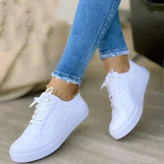 Durable and supportive women's walking shoes with a secure lace-up closure for maximum comfort.