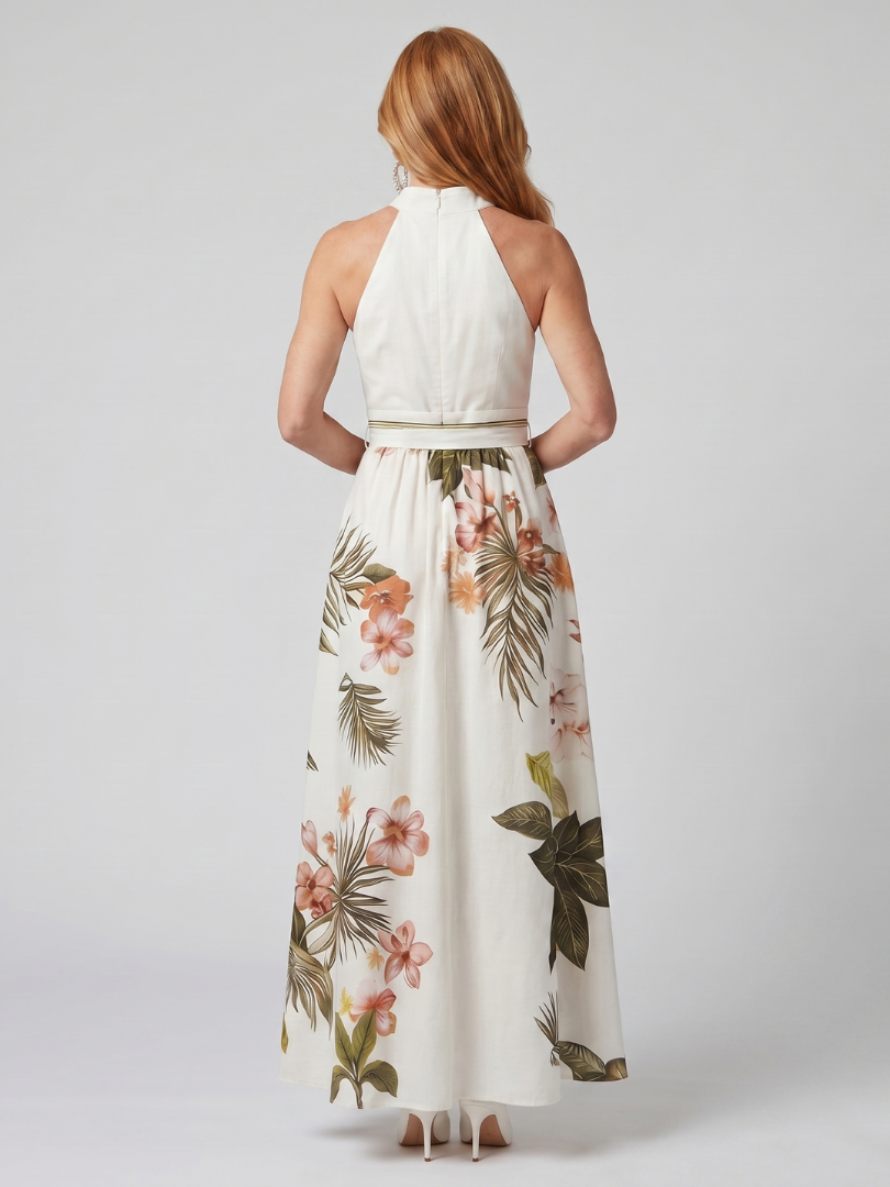 Draped halter maxi dress for women, white with botanical panel. Elegant, flowy, and perfect for summer vacation wear.