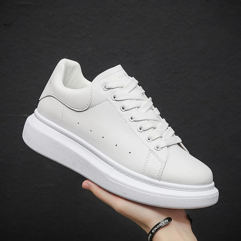 Women's white fashion platform sneakers with chunky sole, perfect for street style & everyday casual wear.