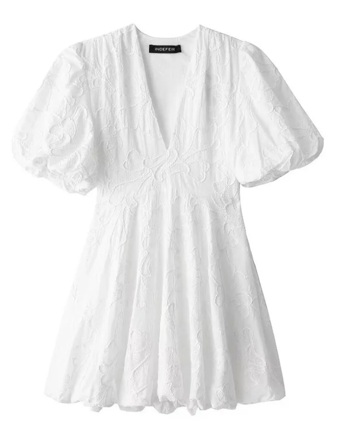 Versatile women's summer floral mini dress, white with puff sleeves, suitable for casual, party, or evening wear.