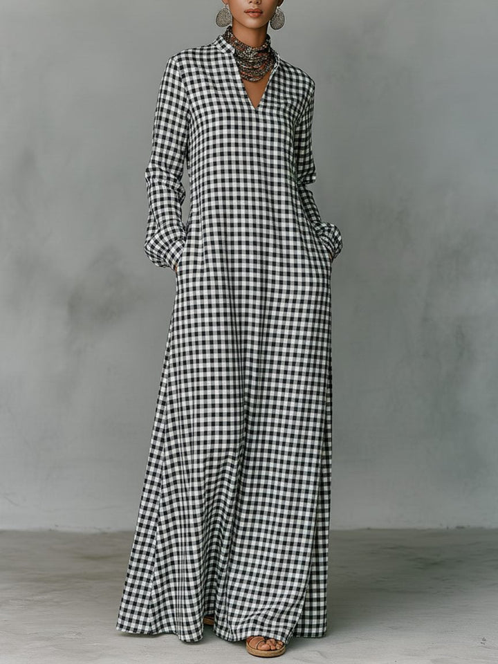 Women's white gingham V-neck maxi dress with long sleeves, perfect for casual summer days or elegant outings.