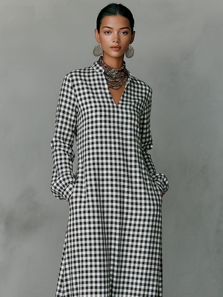 Elegant women's a-line gingham maxi dress with a flattering V-neck, long sleeves & checked pattern for versatile wear.