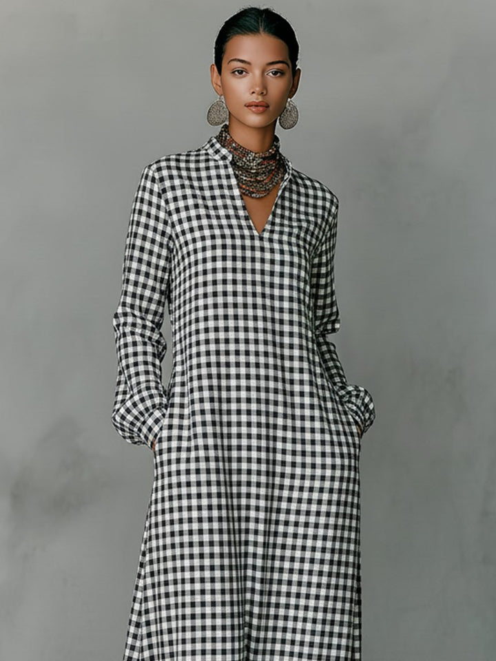 Elegant women's a-line gingham maxi dress with a flattering V-neck, long sleeves & checked pattern for versatile wear.