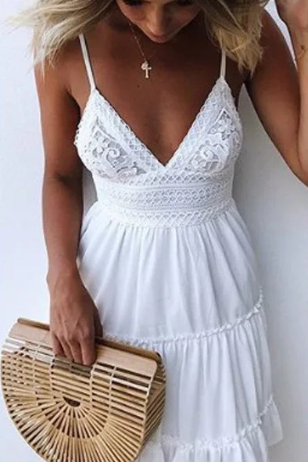 White lace summer mini dress with open back and spaghetti straps. Casual women's tiered sundress, perfect for vacation.
