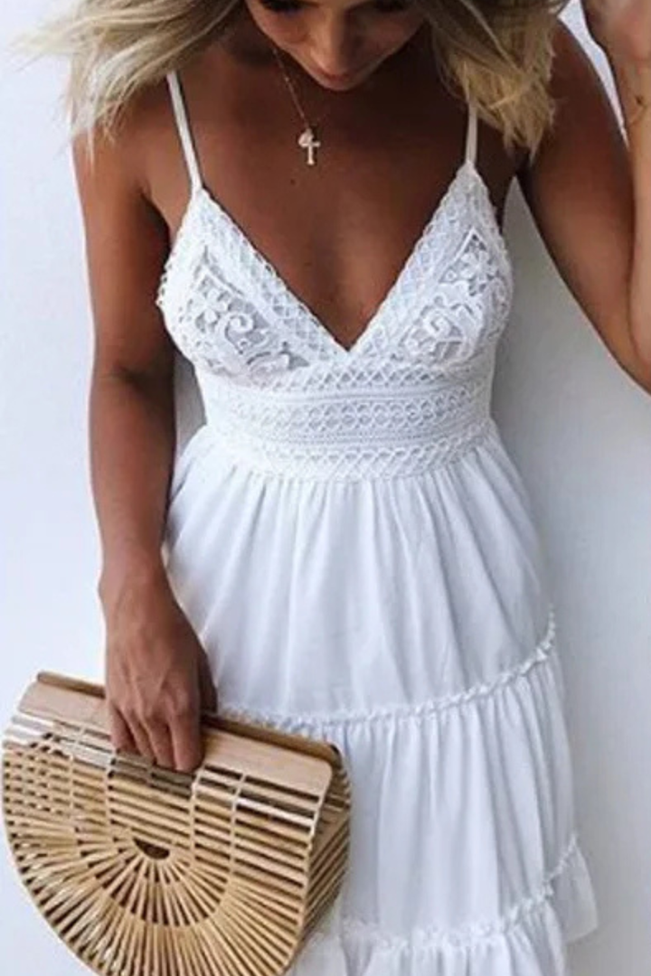 White lace summer mini dress with open back and spaghetti straps. Casual women's tiered sundress, perfect for vacation.