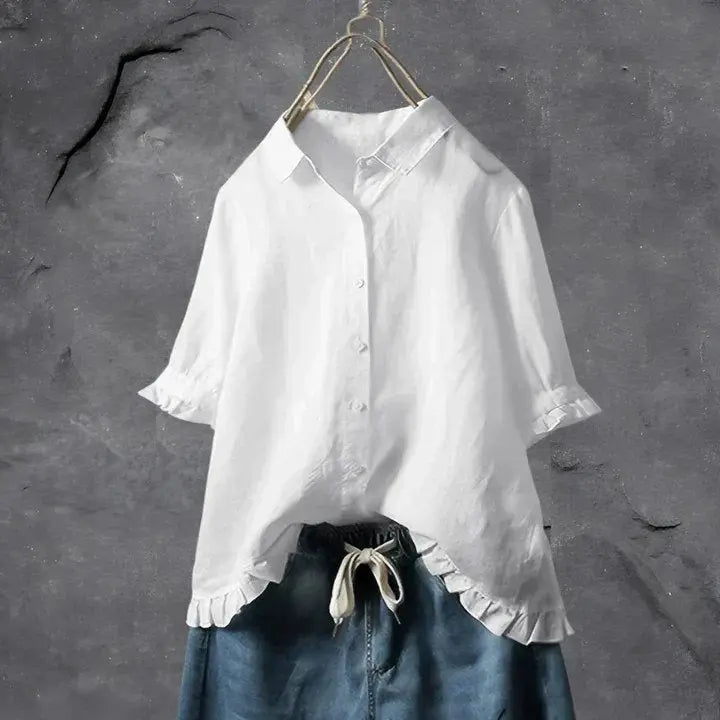 Women's white linen ruffle button-down shirt. Perfect for summer, casual wear, or a relaxed holiday look.