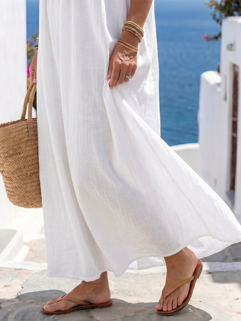 Brown sleeveless maxi dress, natural fabric, effortless style, casual women's fashion.
