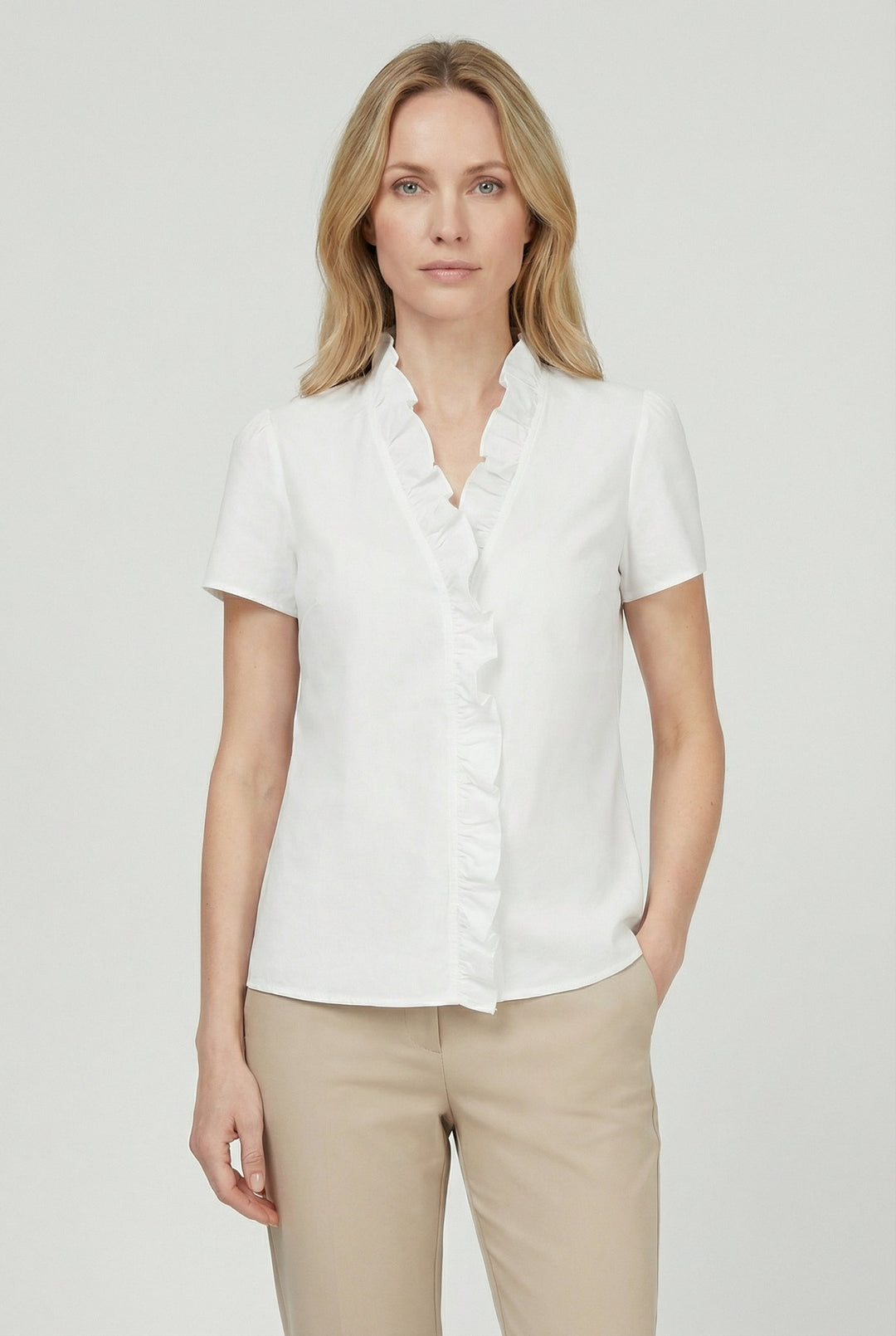 Women's white ruffled long sleeve blouse, a chic casual top for versatile fashion.