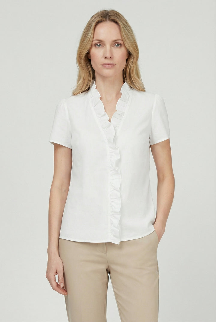 Women's white ruffled long sleeve blouse, a chic casual top for versatile fashion.