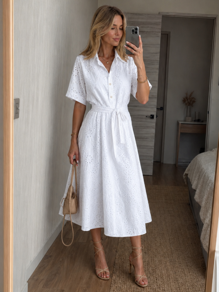 Women's white short sleeve button front midi dress with waist tie, ideal for summer casual wear.