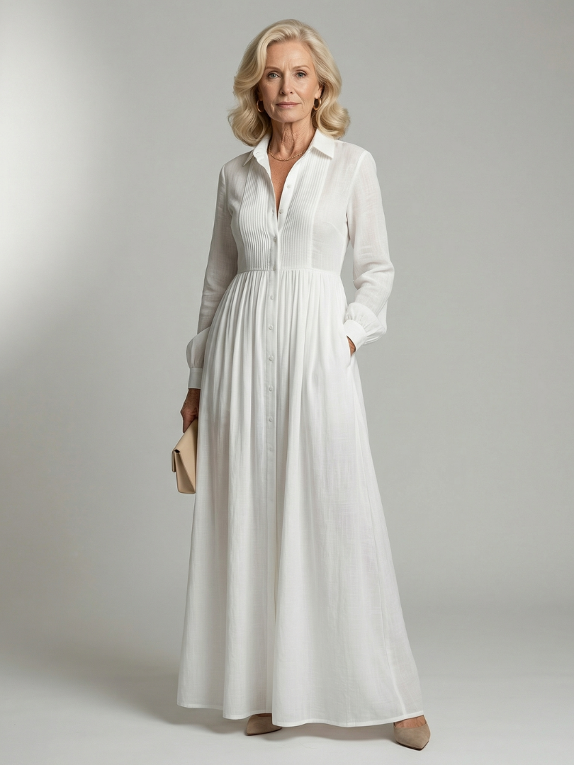 Women's white soft flow long sleeve maxi dress with button front, perfect for comfortable everyday wear.