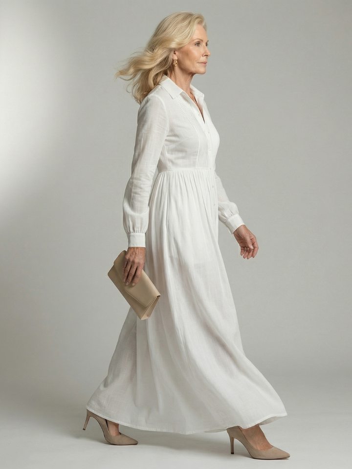 Effortless flowy long sleeve maxi dress for women, featuring a chic button front and gathered waist.