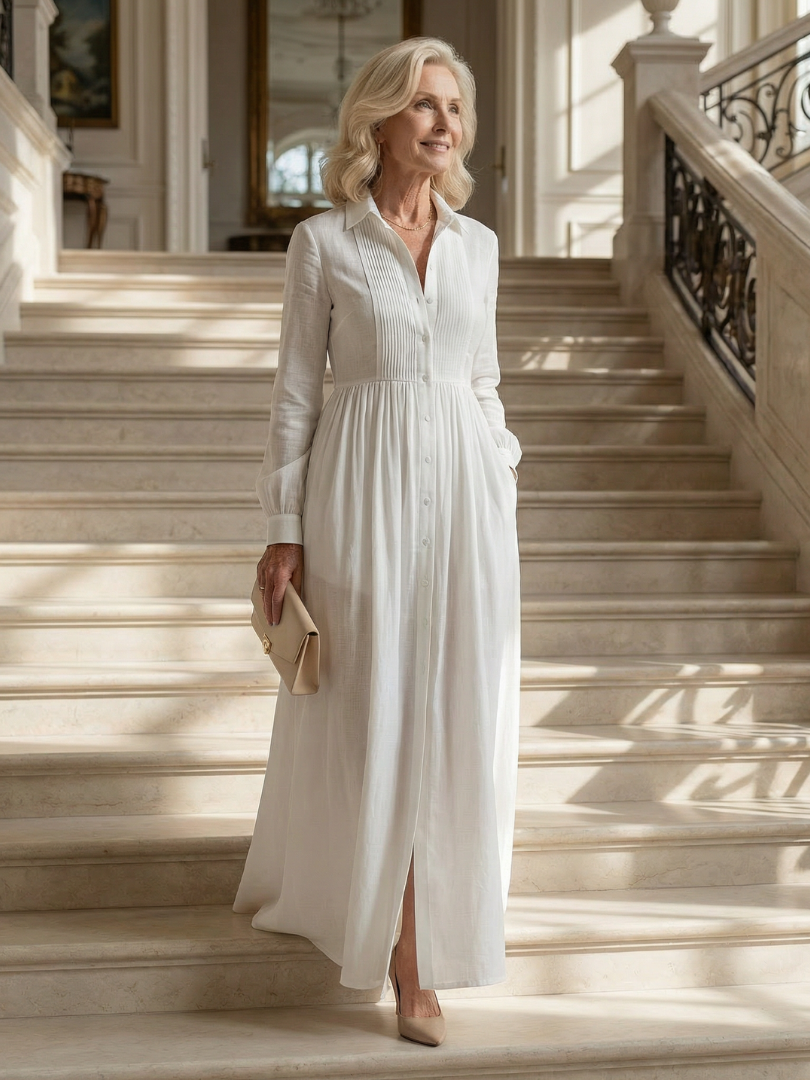 Soft flow women's long sleeve maxi dress, featuring a flattering gathered waist and elegant button front.