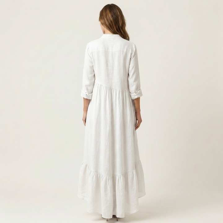 Light blue stand-collar button-front maxi dress for women, featuring a chic ruffle hem, perfect for beach days.