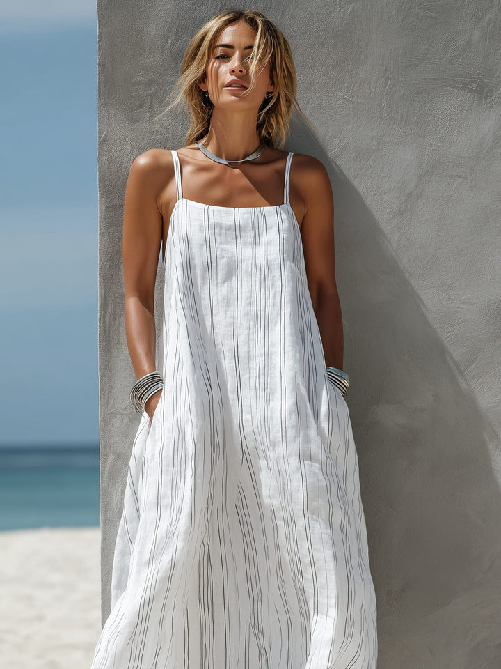 Elegant flowing women's striped maxi dress, sleeveless with a square neck, ideal for summer holidays.