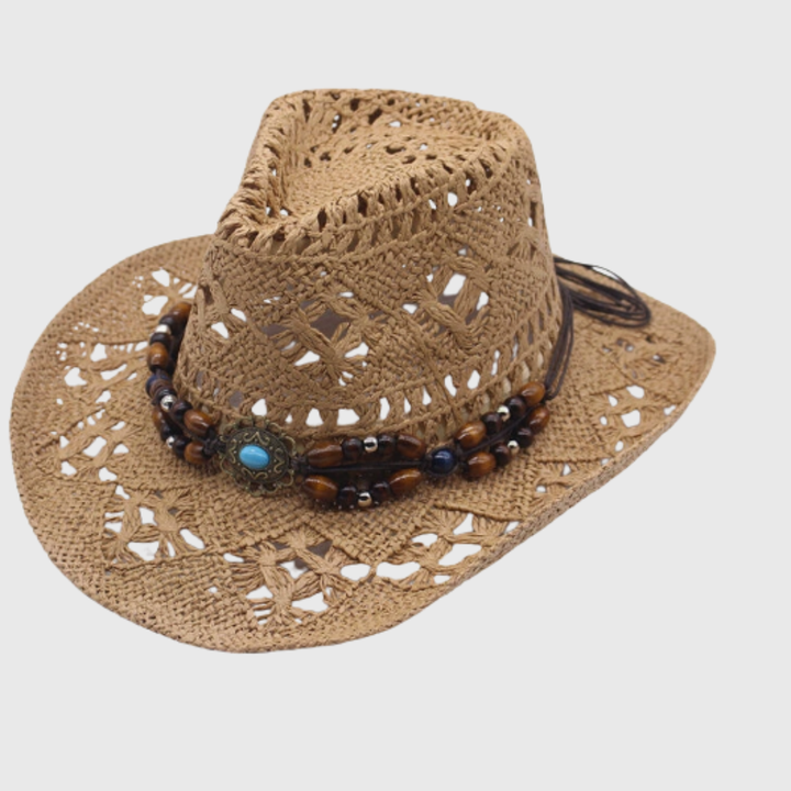 Women's outdoor accessory: wide-brim cowboy hat with decorative band, perfect for summer sun.
