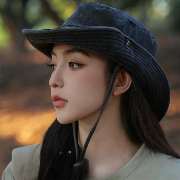 Foldable women's travel sun hat, wide brim and adjustable chin strap. Ideal for beach, hiking & outdoor adventures.
