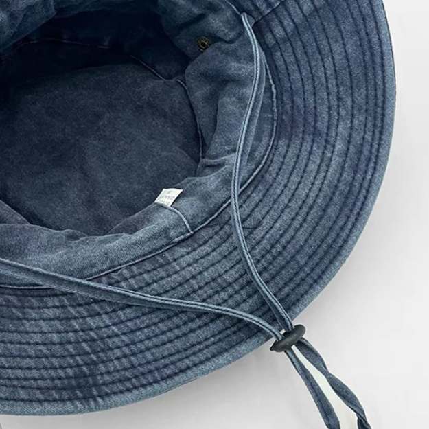 Black women's wide brim outdoor sun hat. Chin strap keeps it secure for hiking, beach, and gardening.