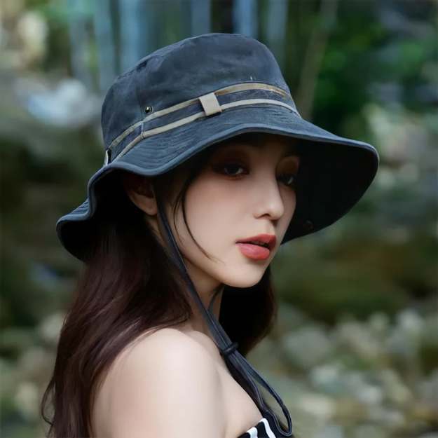 Green women's wide brim sun hat with chin strap. Ideal for outdoor adventures, travel, gardening & beach trips.