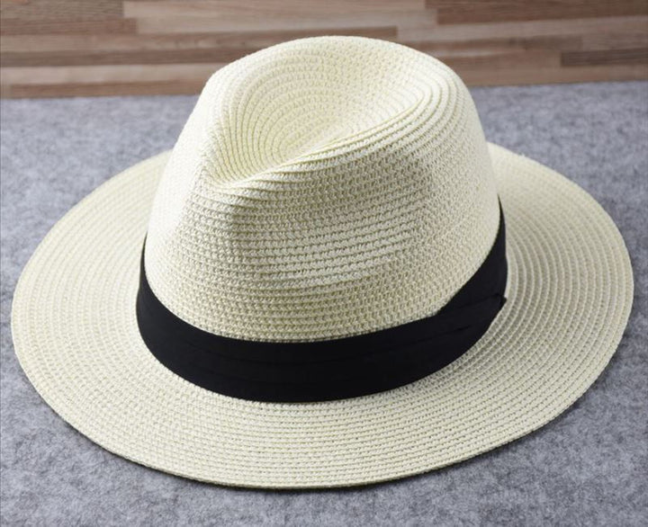 Adjustable women's wide brim straw sun hat, great for beach, garden, or summer vacation.
