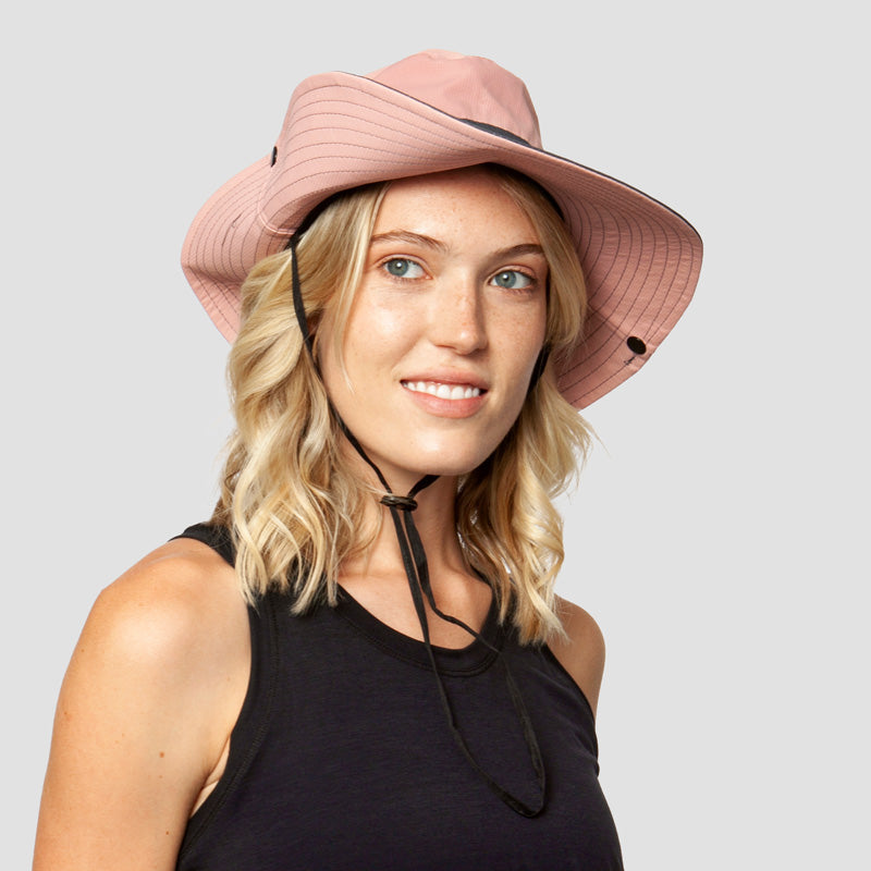 Adjustable women's wide-brim sun hat with ponytail slot, great for summer outdoor activities.