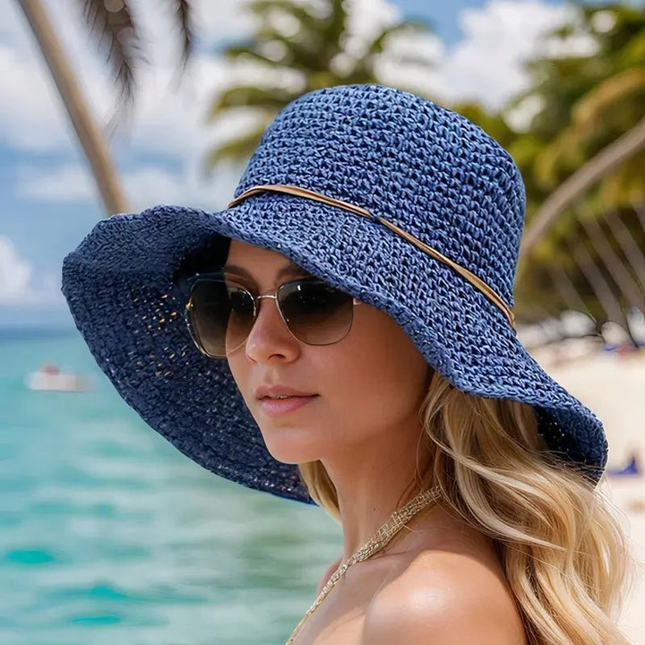 Women's summer straw hat, wide brim design provides excellent UV sun protection for beach or garden.