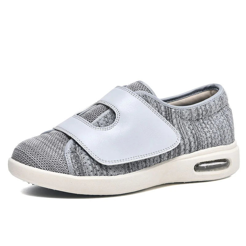 Women's wide fit walking sneakers with convenient Velcro strap for easy adjustability & all-day comfort.