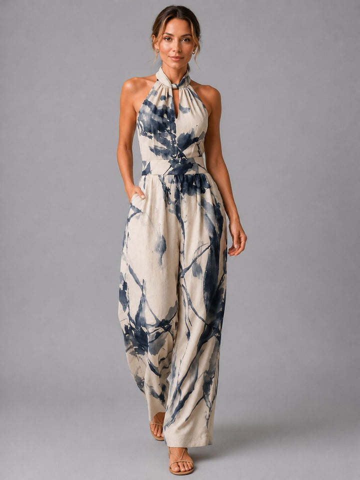 Women's wide leg halterneck jumpsuit in a flowy fabric, perfect for elegant summer wear.