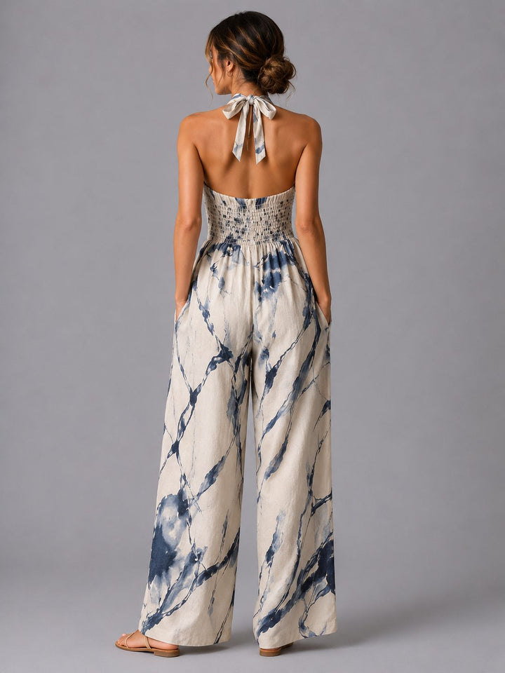 Stylish women's wide leg halterneck jumpsuit. Ideal for casual comfort or chic party outfits.