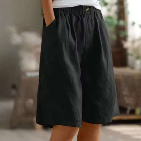 Ultra-comfortable women's wide leg high waist shorts with elastic waist, ideal for relaxed summer day wear.