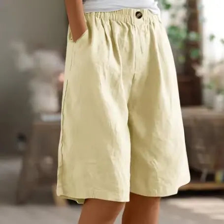 Flowing wide leg opening on women's high waist shorts, breathable & stylish for summer vacations.