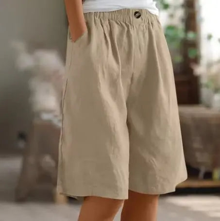 Textured fabric of women's wide leg high waist shorts, emphasizing comfort & relaxed fit for summer fashion.