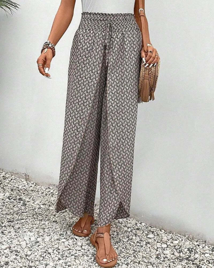 Stylish red flowy wide leg palazzo trousers for women, lightweight & comfortable, perfect for summer.