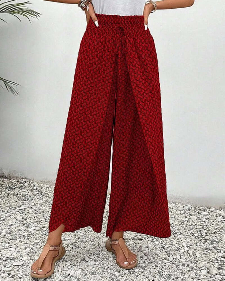 Lightweight flowy wide leg palazzo trousers, women's summer pants, ideal for comfortable vacation wear.