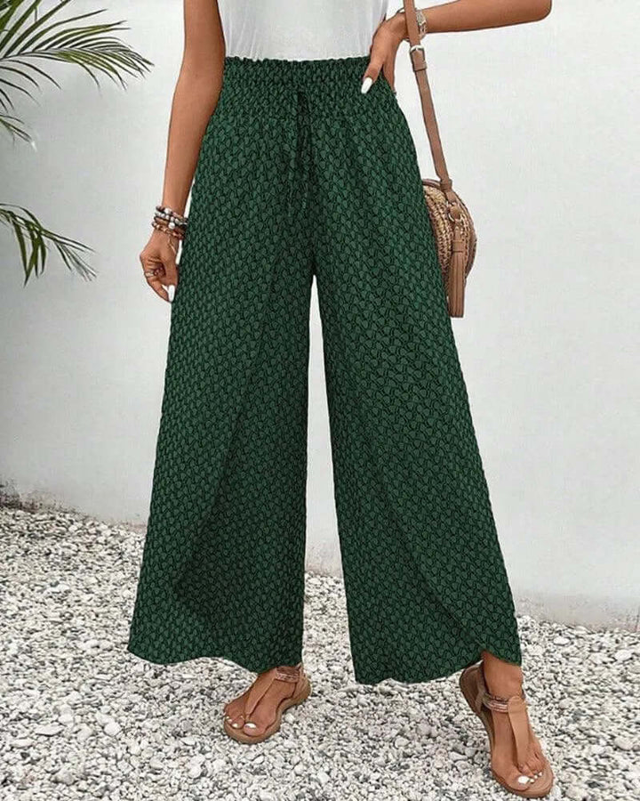Green drawstring flowy wide leg palazzo trousers for women, lightweight & perfect for summer outings.