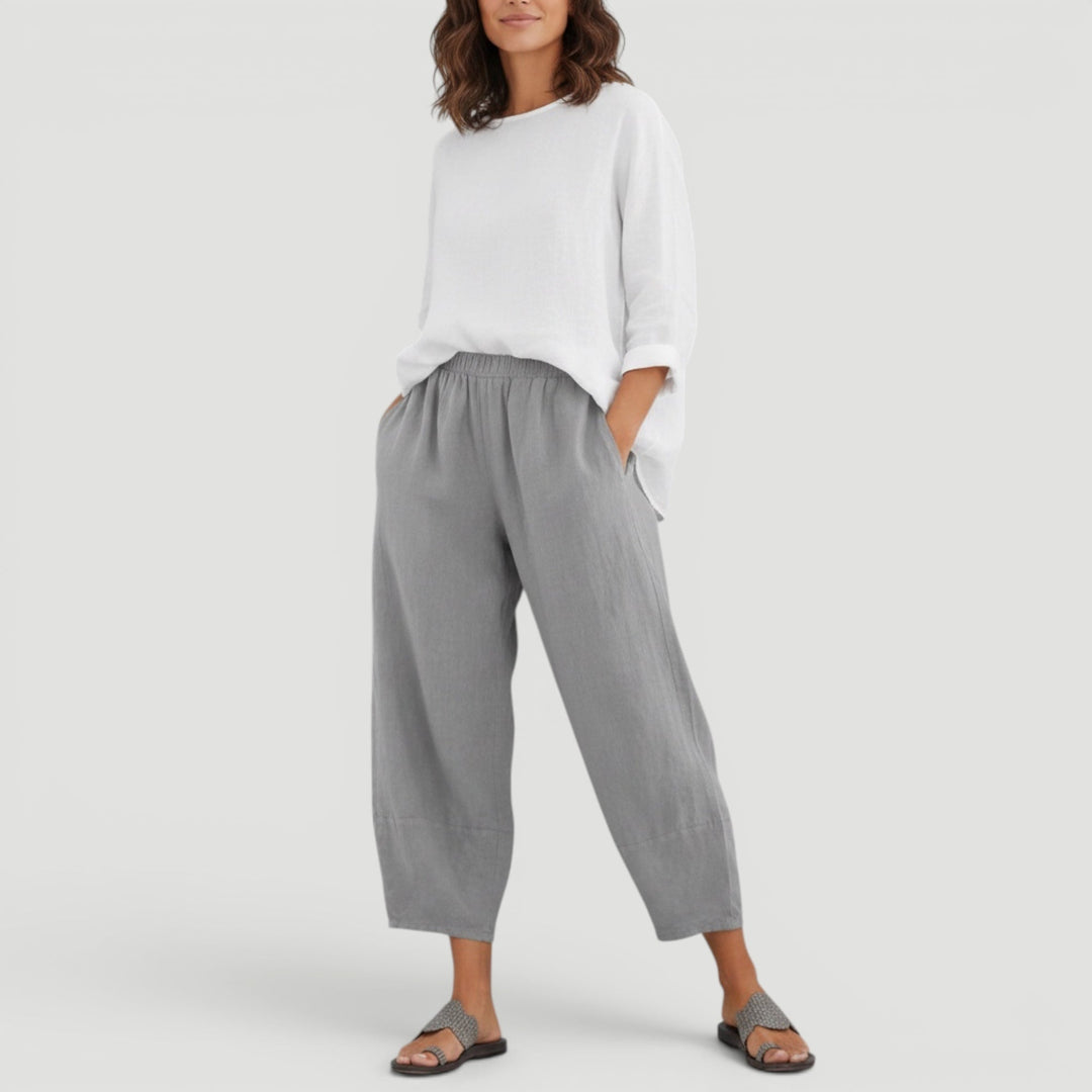 Stylish women's wide leg summer trousers, ideal for resort wear or vacation outfits. Comfortable, flowy, and lightweight.