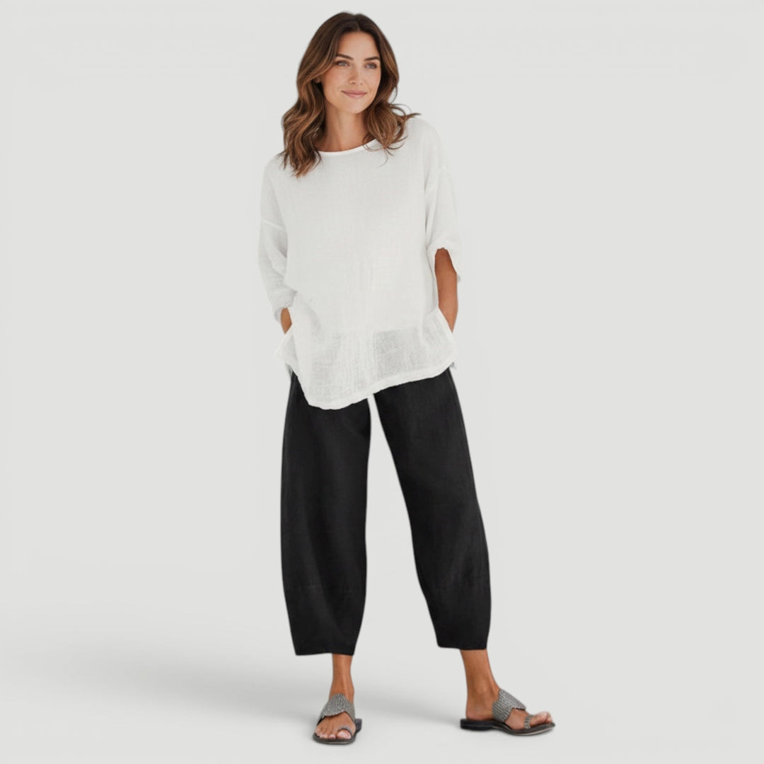 Lightweight women's wide leg pants for summer. Breathable, comfortable, flowy fabric perfect for warm weather fashion.