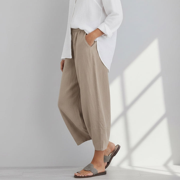 Relaxed fit women's wide leg trousers, high waist design. Perfect lightweight summer pants for comfortable fashion.