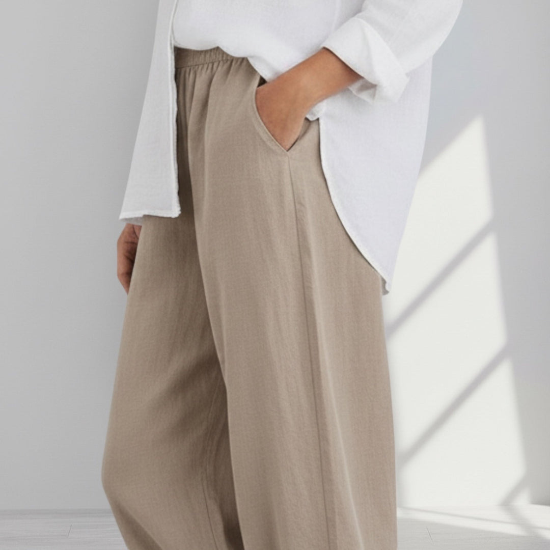 Flowy women's wide leg summer pants, lightweight and comfortable for vacation or casual wear. Easy care trousers.