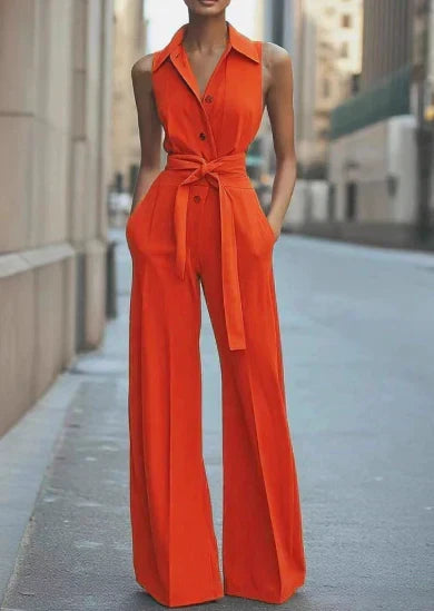 Women's wide leg sleeveless jumpsuit with tie waist, perfect for elegant summer fashion. Versatile one-piece style.